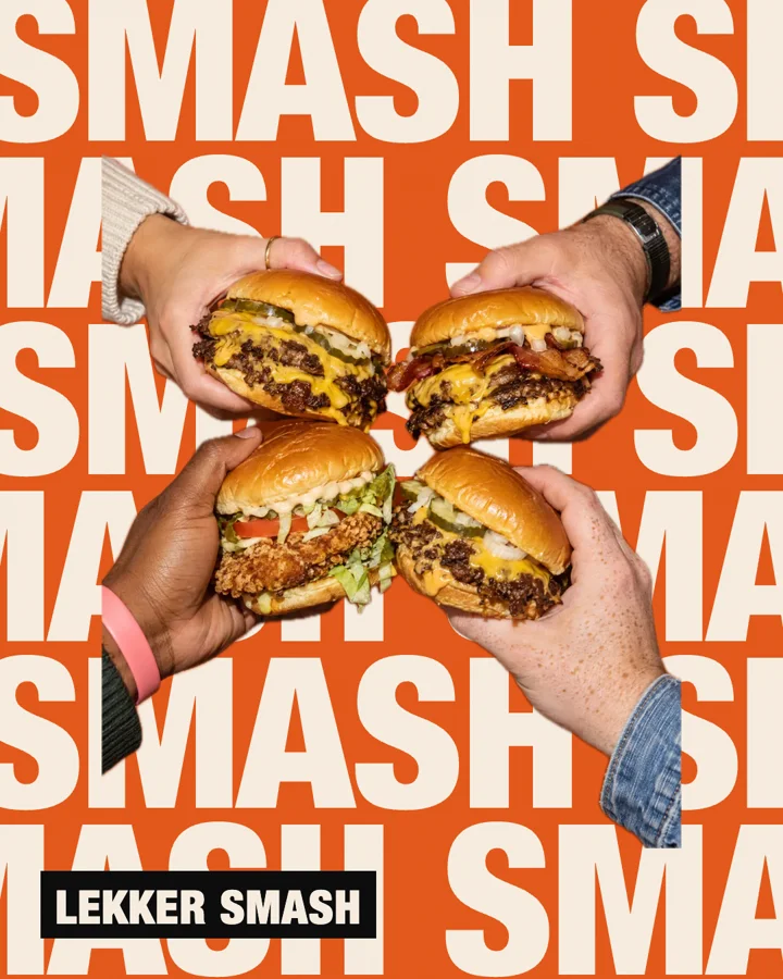 A Lekker Smash feed ad, four burgers held over a wall of the word smash